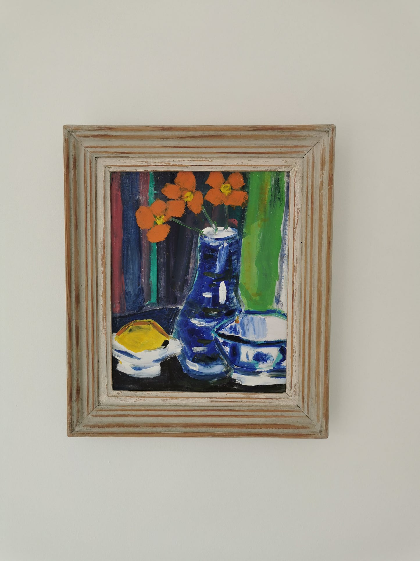 Orange Flowers in Blue Vase