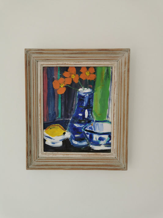 Orange Flowers in Blue Vase